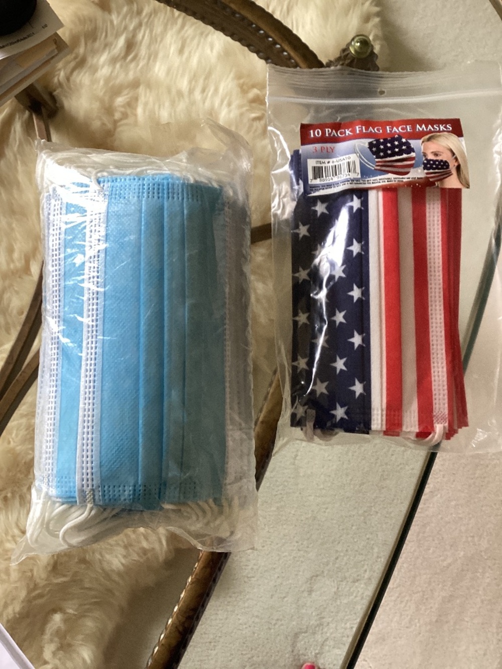 New unopened -2 packs of face masks 1) 10 Flag Masks 2) 50 Blue Masks
